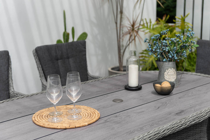 Martinique carver garden table